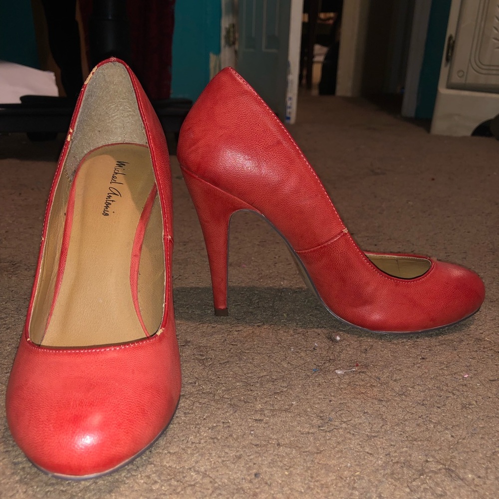 Red/orange heeled shoes